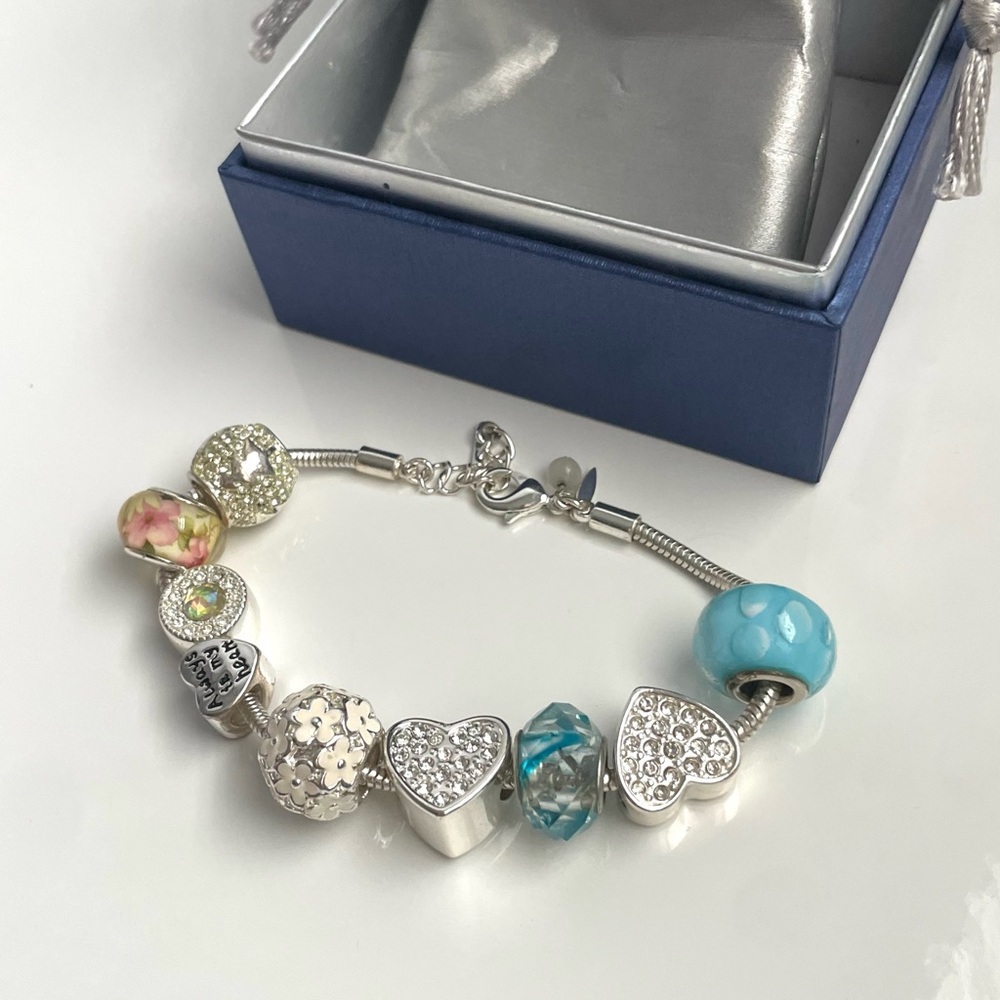 Avon Elegant Silver and Blue Charm Bracelet
